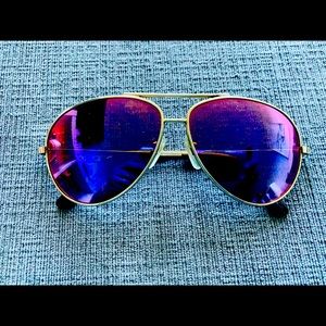 Vintage REVOS sunglasses.